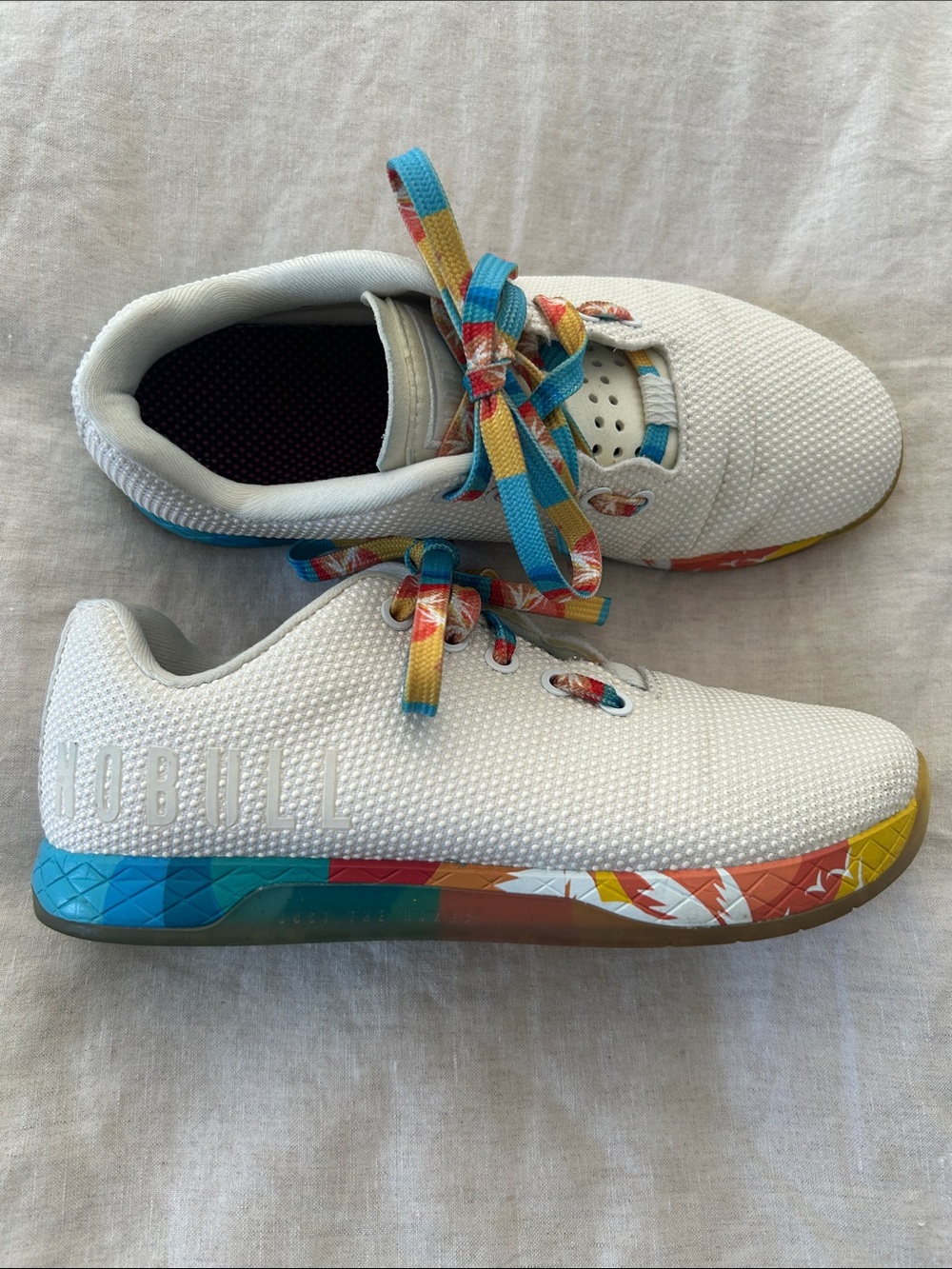 NOBULL White Knit Trainer with Rainbow Multi-Color Sole and Laces